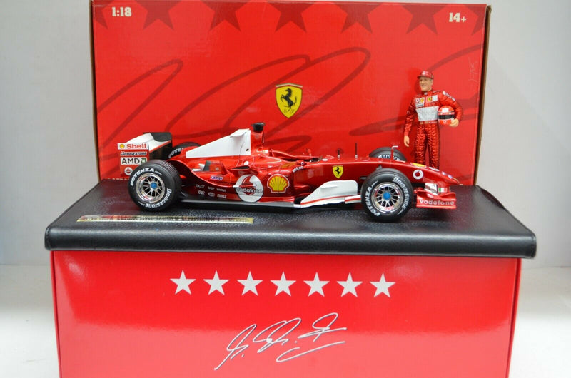 1:18 Hot Wheels Ferrari F1 2004 Michael Schumacher 7 times World Champion  w/ fig